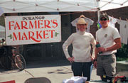 Market organizers Carol Clark and Greg Vlaming stop for a minute to mug for the camera.