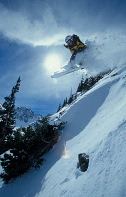 Coming in for a landing:  Silverton Mountain's Jen Ader launches last year at the area.  Silverton Mountain hopes to again offer guided tours this year, with passes running $99 for a full-day guided tour. / Photo by Scott Smith