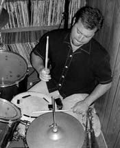 Drummer Aaron Lambardo, who joined the band last spring, busts a beat that would make John Bonham proud./Photo by Bryant Ligget