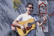 Kurt Liebert, lead singer of Bicycle, a band from Seattle, belts one out for the crowd gathered on Main Avenue last Saturday.
