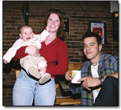 7-month-old Summer Rogers, Sara Henrich, and Marcus Mahanty soak up the atmosphere at their first Punk Rock Breakfast.