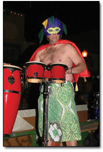 I'm too sexy for my bongos: Despite cool temperatures, many parade goers shed their clothes in keeping with the Carnaval theme.
