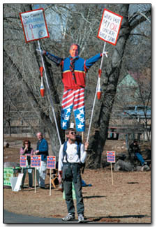 Greg Rossell shows his opposition to President George Bush with a life-sized effigy of the commander-in-chief.