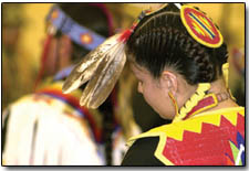 A dancer bows her head in prayer at the Hozhoni Days Pow-Wow.