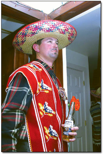 Ryan Dodge, of Durango Mountain Resort, guards the Mexican coastal cuisine prepared by the Love Banditos.