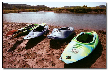 Free parking: Kayaks, courtesy of Four Corners River Sports, await the use of the more adventurous of festival goers.