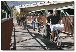 Russell Zimmerman, of Durango Cyclery fame, leads the cruiser pack across the bridge at Santa Rita on Saturday.