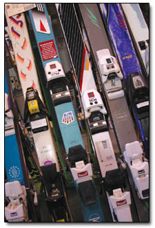 A rack full of skis gets the once over as shoppers look for the perfect buy.