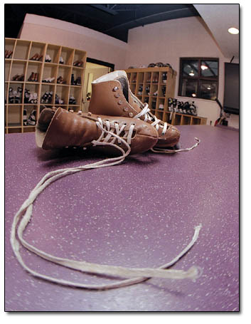 A pair of rental skates lies on the floor of the new Chapman Hill pavilion.