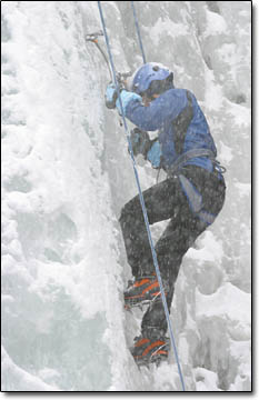 Beth Morin scrambles up the ice during her inaugural ice climbing experience.