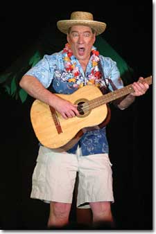 Roger Olivier, of the Sand Snappers, hams it up to a laughter-filled crowd during the Follies.