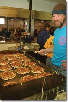 Griz Kelley works the skillet at the fairgrounds for the pancake breakfast benefitting the La Plata County Search and Rescue.