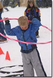 Gavin Hurd, 6, works his way through the obstacle course at the Snow Games on Saturday.
