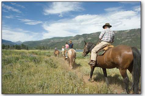 
  A group on horseback enjoys a trail ride near the north end of Vallecito Reservoir last weekend under summer skies.
