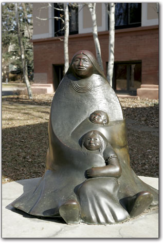 The bronze sculpture titled "My Children," by Adam Houser, adorns the entryway to the library.