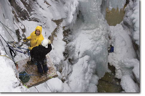 Ice festival volunteers get the routes cleaned and rigged for the speed climbing competition.