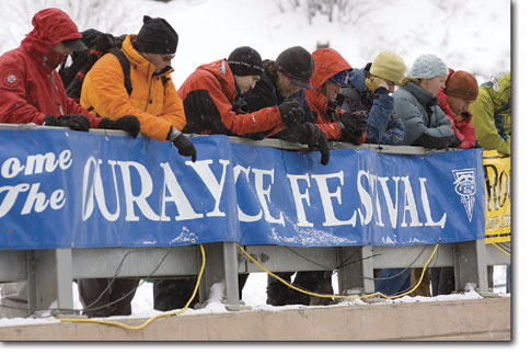 Spectators take in the speed climbing competition from atop the high bridge at the Ouray Ice Park on Sunday.