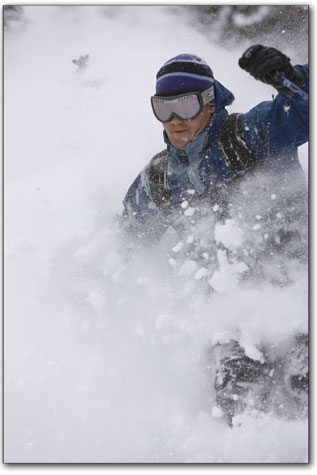 Tylor Scheid, of Durango, reaped the benefits of keeping a
watchful eye on recent snow and weather reports as he carves up the
fresh snow at Silverton Mountain.