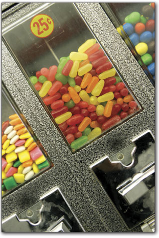 A candy machine full of sweets tempts customers at Town Plaza
Coin Laundry.