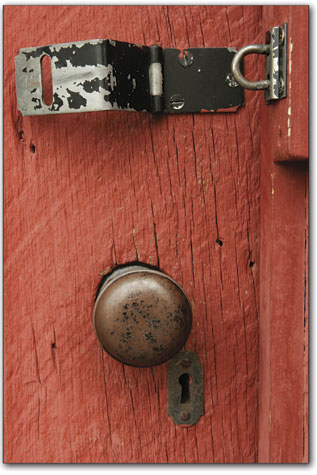 The door handle of the Joy Cabin, built by blacksmith Charles B.
Joy in the 1870s, remains dry on a wet Tuesday afternoon.