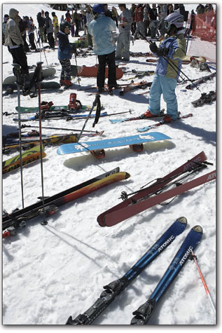 Eager to get to the aprs celebration, skiers and snowboarders
discarded their gear haphazardly at the base area.