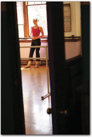 Angela LaBonde watches over the progress of her ballet class at
The Dance Center on Monday morning.