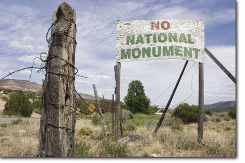 A now-dated sign opposing the monuments designation weathers in
the McElmo Canyon sun. The monument was designated by presidential
proclamation on June 9, 2000.