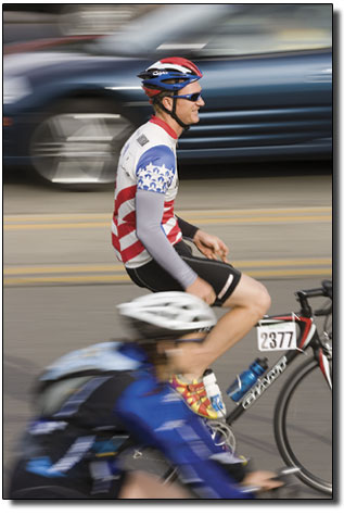Peter Jensen, of Durango, relaxes as he makes the trip up Main
Avenue towards the valley shortly after the race began.