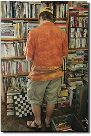 Charlie Kolb peruses the titles at the Southwest Book
Trader.