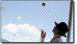 Nick Skahill 14, tosses a ball during the pre-game ceremonies.
Skahill, along with all of the players, were dressed in period
clothing.