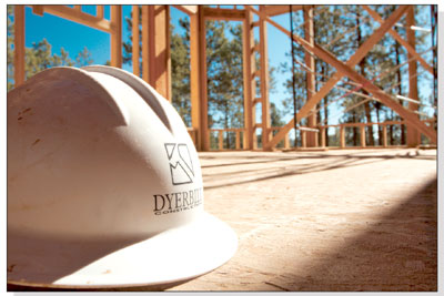 A hardhat sits near the frame of a new house just west of
Durango.