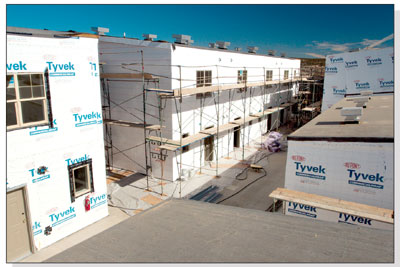 Tyvek as far as the eye can see. This new housing complex awaits
an exterior at Three Springs development behind the new
hospital.