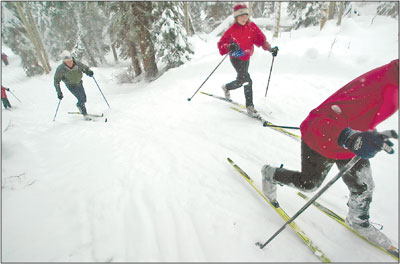 Members of the Durango Nordic Ski Team run some relays to get
the blood pumping along Aspen Loop on Saturday morning.