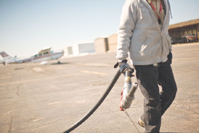The fuel hose is essential equipment at the Jet Center.