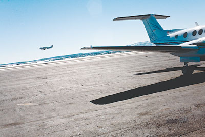 A private plane takes flight after a refuel.