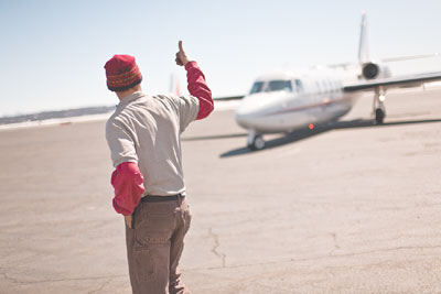 Gus Westerman, with the Durango Jet Center, gives a pilot the OK
for taxi Tuesday morning.