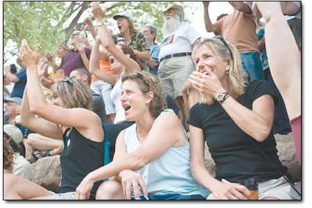 The crowd at the Whitewater Park on Friday reacts to carnage
during the parade.