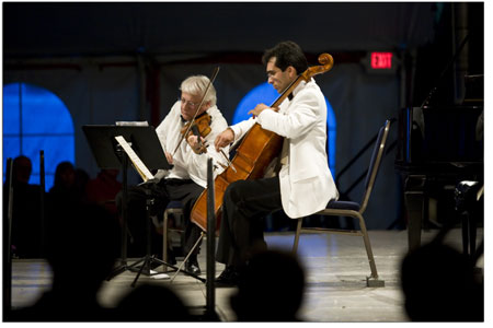 Arkady Fomin, left, and Jesus Castro-Balbi (along with David
Korevaar who is not pictured), perform Rachmaninovs Trio Elegiaque
for Violin, Cello and Piano.