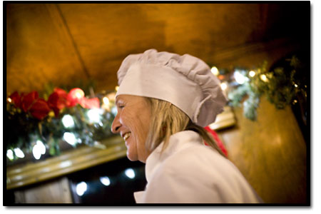 Chef Donna Walters leads one of the cars in carols during the
ride back to town.