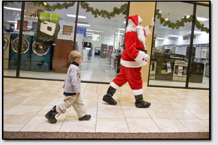 Wherever Santa goes, anxious children seem to fall into step
behind in hopes of a chalking up a few more brownie points.