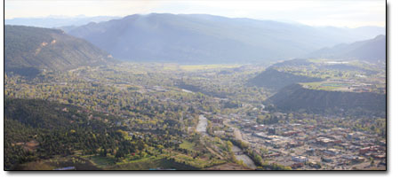 Sunlight begins to flood Durango as the sun crests Raider Ridge
from this early morning view atop Smelter Mountain.