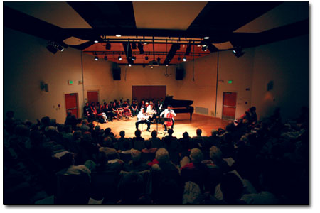 The crowd listens intently at the Roshong Recital Hall.