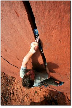 Chris Trimble, of Durango, places protection in a perfect
crack.