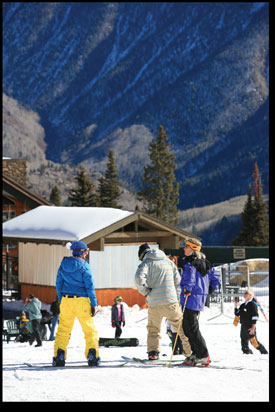Skiers and boarders sport the latest in ski-area fashion at the
base of DMR.