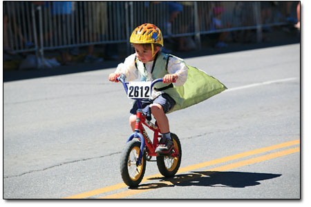 Bear witness to the future of cruiser criteriums as this young
lad makes his way down the final stretch.