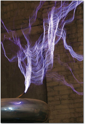 A sharp electric discharge bursts between two conductors, known
as a spark gap.