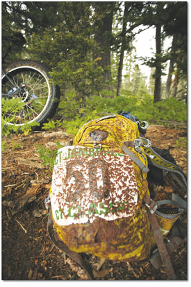 A muddy, wet pack, eagerly discharched by a rider having reached
camp after the first 35-mile leg.