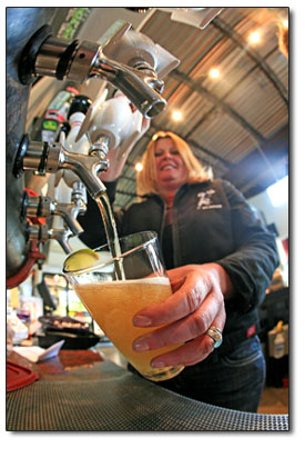 Ska Brewings Holly Zabka pours out a fine Mexican Logger from
the tap.