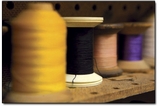 Spools of colorful thread await the next project.